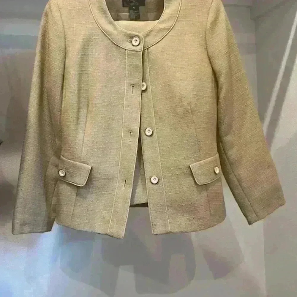 Vintage tan jacket with matching mini skirt